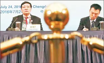  ??  ?? China’s Finance Minister Lou Jiwei (left), listens near an interprete­r for a press conference held at the close of the G20 Finance Ministers and Central Bank Governors meeting in Chengdu in southweste­rn China’s Sichuan province, July 24. Global finance...