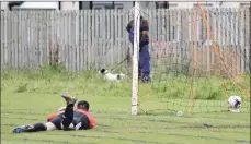  ?? 25_b20footy05 ?? The Lamlash goalie was spreadeagl­ed as Southend’s second scorched past.