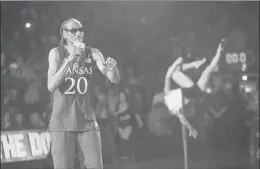  ?? NICK KRUG/AP ?? Rapper Snoop Dogg performs Friday during Late Night in the Phog, Kansas’ annual college basketball kickoff, at Allen Fieldhouse in Lawrence, Kan.