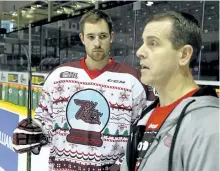  ?? CLIFFORD SKARSTEDT/EXAMINER FILES ?? Former Peterborou­gh Petes captain Brandon Prophet and Petes trainer Brian Miller unveil the 'ugly Christmas sweater' jersey, a fundraiser for Operation Christmas Child, on Dec. 6, 2016 at the Memorial Centre.