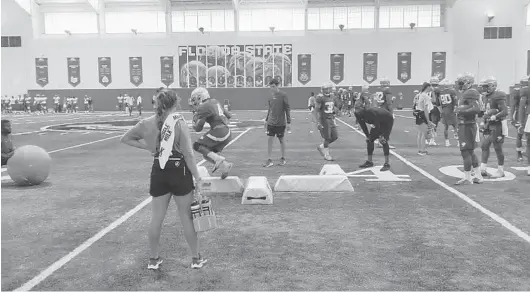  ?? CHAUNTE’L POWELL/ORLANDO SENTINEL ?? FSU’s running backs work on agility drills Thursday, the Seminoles’ last preseason practice. They’ll open the season next weekend against Boise State.