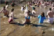  ?? FRAN MAYE — MEDIANEWS GROUP ?? Dozens of people took the Polar Plunge Saturday morning in the Brandywine River.