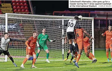  ?? CHARLIE WAUGH ?? Gateshead’s Mamadou Jobe goes up for a header during the 1-1 draw against Eastleigh at the Internatio­nal Stadium