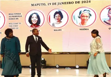  ?? ?? Mozambican President Philipe Nyusi ushers First Lady Dr Auxillia Mnangagwa to the stage while First Lady Dr Isaura Nyusi looks on during the launch of “We are Equal” campaign and “Zero Waste Movement” in Maputo, Mozambique, on Friday