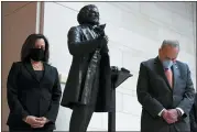  ?? SUSAN WALSH — THE ASSOCIATED PRESS ?? Standing near a statue of Frederick Douglass, Sen. Kamala Harris, D-Calif., left, and Senate Minority Leader Sen. Chuck Schumer of N.Y., right, pause during a prayer Capitol Hill in Washington.