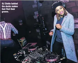  ??  ?? DJ Zinhle behind the decks makes feet find their groove.