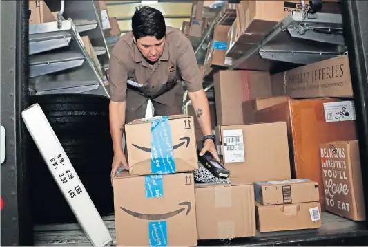  ?? [LYNNE SLADKY/THE ASSOCIATED PRESS] ?? Amazon’s Prime Day is actually 48 hours long and is expected to result in big sales for the online retailer. Dow 27,359.16 Nasdaq 8,258.19 S&P 3,014.30 Russell 1,561.82 NYSE 13,233.39 Gold Silver Platinum Copper Oil