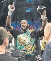  ?? FOTO: AP ?? Y ahora espera Joshua. Wilder, con el cinturón CMB