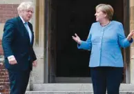  ??  ?? This picture taken on Friday shows Prime Minister Johnson with German Chancellor Merkel at Chequers, the official country residence of the prime minister, near Aylesbury, Buckingham­shire.