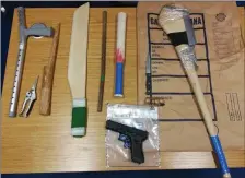  ??  ?? Some of the weapons seized during raids undertaken last Thursday by Gardai from the Mallow District under Operation Thor