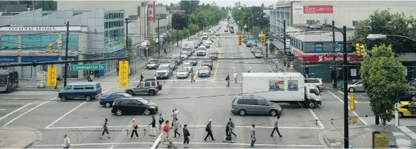  ?? PHOTOS: JENELLE SCHNEIDER/PNG ?? The Grandview-Woodland Citizens Assembly has recommende­d a separated bike lane along busy Commercial St., shown at its intersecti­on with Broadway, looking west, above.