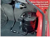  ??  ?? Water injection tank is neatly installed in the boot