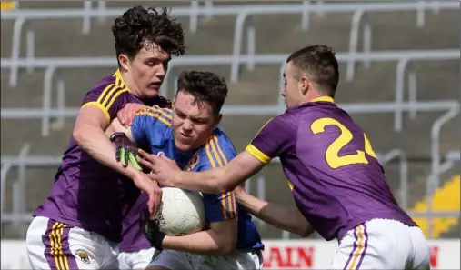  ??  ?? David Gouldson and Seán Nolan tacking James Tyrrell of Wicklow during the victory over Wicklow in Innovate Wexford Park.