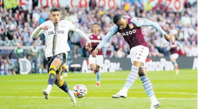  ?? AP ?? Aston Villa’s Leon Bailey (right) scores during the English Premier League football match between Aston Villa and Everton at Villa Park, Birmingham, England.