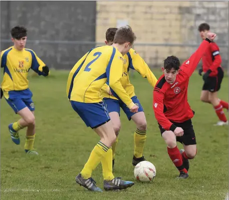  ??  ?? Derek O’Shea, Tralee Dyanmos, (right) and Cathal Deasy, Douglas Hall, in action in their FAI U-17 Cup at Mounthawk Park, Tralee last Sunday. Photo by Domnick Walsh