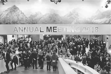  ??  ?? Attendees take part at a reception event after the Crystal Award ceremony during the World Economic Forum (WEF) annual meeting in Davos, Switzerlan­d January 22. — Reuters photo