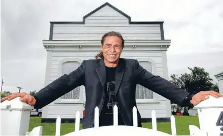  ?? Photo: KEVIN STENT/FAIRFAX NZ ?? Surf’s up: Te Rahui Cowan moved to Carterton two months ago after buying a renovated historic building in Holloway St. He thinks the town’s combinatio­n of new housing developmen­ts and ‘‘beautiful old villas’’ such as his is part of the reason for its...