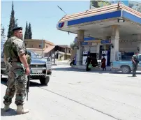  ?? Reuters ?? Lebanese army soldiers patrol a street at the entrance of the border town of Arsal in eastern Bekaa Valley on Friday. —