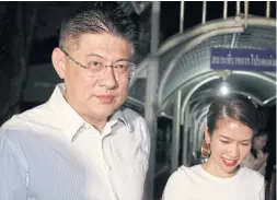  ?? WICHAN CHAROENKIA­TPAKUL ?? Ex-TV news anchor Sorrayuth Suthassana­chinda walks free from Bangkok Remand Prison yesterday after being awarded bail.