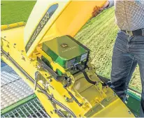  ?? Pictures: Stefan Longin. ?? Left: an Evo NIR forage analyser can be installed on New Holland’s big square balers, as well as forage harvesters and combines. Above: the latest-spec HarvestLab 3000 constituen­t analyser installed on the spout of a John Deere self-propelled forage...