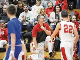  ?? MARC PENDLETON PHOTOS / STAFF ?? Twin Valley South coach Tony Augspurger (center) is in his 32nd season as the Panthers’ coach. His team suffered a 60-58 loss to Brookville on Monday. The teams could meet again in a Division III sectional final.