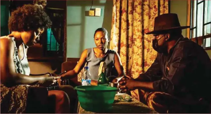  ?? Swallow ?? Ijeoma Grace Agu, Eniola ‘Niyola’ Akinbo, and Kunle Afolayan on set of