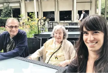  ?? DANIEL KNOLL VIA THE ASSOCIATED PRESS ?? Mireille Knoll, centre, is seen with her son Daniel and granddaugh­ter Jessica. Knoll, 85, was stabbed 11 times and killed Friday in her apartment, which was then set on fire, according to a French judicial official.