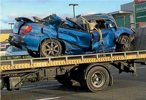  ?? SUPPLIED ?? The car that crashed at Longburn, near Palmerston North, on Monday, killing two young people, one of whom was driving.