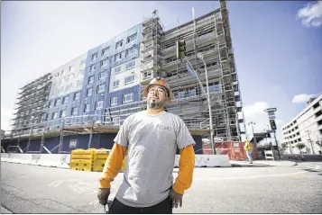  ?? PHOTOS BY ALLEN J. SCHABEN / LOS ANGELES TIMES ?? Francisco Martinez, a sheet metal worker from Guadalajar­a, Mexico, works for a nonunion contractor in Los Angeles and lives with his wife and four kids in a rented two-bedroom apartment. He’s in his 40s, doesn’t have retirement savings, and his health...