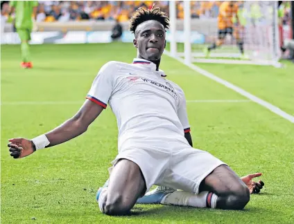  ??  ?? Chance taken: Tammy Abraham has had to bide his time, being sent out on loan often, but is finally shining for Chelsea