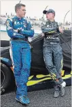  ?? NICK WASS THE ASSOCIATED PRESS ?? Alex Bowman, left, talks with William Byron during a weather delay at Dover Internatio­nal Speedway in May.