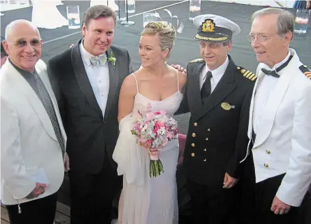 ?? TORONTO STAR FILE PHOTO ?? “The Love Boat” ’s Jill Whelan weds Michael Chaykowski aboard the Caribbean Princess on its inaugural cruise on April 11, 2004. Also on board: the show’s captain Gavin McLeod, left, Caribbean’s captain Guiseppe Romano; and Bernie Kopell, “The Love Boat” ‘s doctor.