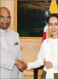  ??  ?? Myanmar State Counsellor Aung San Suu Kyi greets President Ram Nath Kovind in Naypyidaw yesterday.