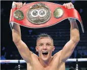  ?? Picture: GETTY IMAGES/ALEX LIVESEY ?? BRUISING BATTLE: JoshWarrin­gton beat Carl Frampton on points to retain his IBF featherwei­ght title.