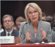  ?? WIN MCNAMEE/GETTY IMAGES ?? “We need more of them, not fewer,” Betsy DeVos says.