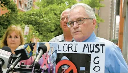  ?? LLOYD FOX/BALTIMORE SUN ?? Frank Schindler, right, a clergy sex abuse survivor, takes part in a news conference Monday as Teresa Lancaster, left, and David Lorenz, also abuse survivors, listen.