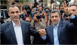  ??  ?? Former Iranian President Mahmoud Ahmadineja­d (right) and his ally Hamid Baghaei arrive at the interior ministry to register their candidacy for presidenti­al elections in Tehran on Wednesday.