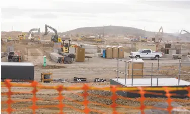  ?? Leah Nash / New York Times ?? Work has begun on the first of two 450,000-square-foot data centers Facebook is building in Prineville.