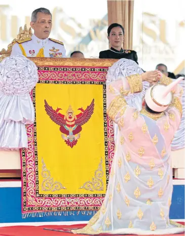  ?? CHANAT KATANYU ?? His Majesty the King, accompanie­d by his daughter, Her Royal Highness Princess Bajrakitiy­abha, presides over the Royal Ploughing Ceremony at Sanam Luang yesterday. The King is greeted by Lord of the Plough Theerapat Prayurasid­dhi, who is the...