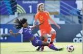  ?? XINHUA ?? Team China’s Zhi Jie fights for control of the ball with a Haitian opponent during Monday’s FIFA U-20 Women’s World Cup Group D match in Saint-Malo, France. Zhao Yujie and Shen Mengyu scored to give China a 2-1 victory.