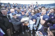  ?? Arnold Gold / Hearst Connecticu­t Media ?? The Yale football team celebrates after beating Harvard to clinch 2017 Ivy League title at the Yale Bowl. The 2019 game between the rivals will be played at noon on Nov. 23 in New Haven.