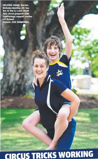  ??  ?? HELPING HAND: Darrien Nicholas- Bentley, 20, has fun in the La Luna Youth Arts circus program with Cootharing­a support worker Liz Boland. Picture: ZAK SIMMONDS