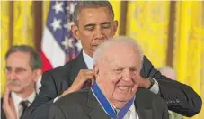  ?? | JACQUELYN MARTIN/ AP ?? President Barack Obama awards Abner Mikva the Presidenti­al Medal of Freedom on Nov. 24, 2014.