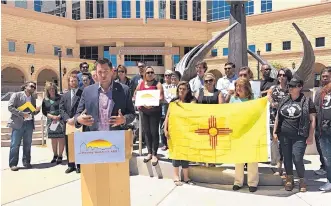  ?? MARTIN SALAZAR/JOURNAL ?? City Councilor Pat Davis speaks in favor of a proposed city sick leave ordinance in front of the state District Courthouse in Albuquerqu­e on Thursday.