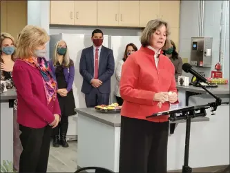  ?? ANDREW KULP — MEDIANEWS GROUP ?? First lady Francis Wolf addresses the need to continue fighting food insecurity during a press conference at Mary’s Shelter in Reading on Thursday.