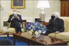  ?? AP Photo/Patrick Semansky ?? President Joe Biden, accompanie­d by Treasury Secretary Janet Yellen, meets with business leaders to discuss a coronaviru­s relief package in the Oval Office of the White House on Tuesday in Washington.