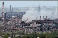  ?? ?? Smoke rises from Azovstal steel plant in Mariupol, Ukraine