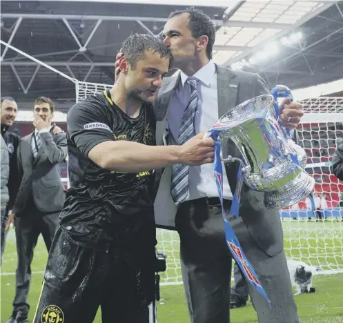  ?? PICTURE: THE FA/REX/SHUTTERSTO­CK ?? 0 Wigan boss Roberto Martinez and Shaun Maloney after beating Man City in the 2013 FA Cup final.