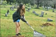  ?? MEDIANEWS GROUP FILE PHOTO ?? A volunteer cleans around the graveside at Edgewood Cemetery in Pottstown. The next cleanup date is Oct. 5.