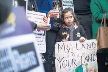  ?? Gina Ferazzi Los Angeles Times ?? PROTESTERS DEMONSTRAT­E against executive orders on immigratio­n at L.A. City Hall Wednesday.